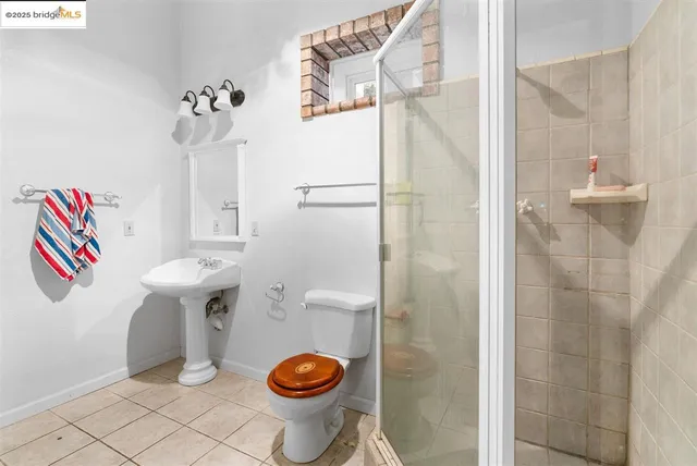 a view of a city with lush green forest