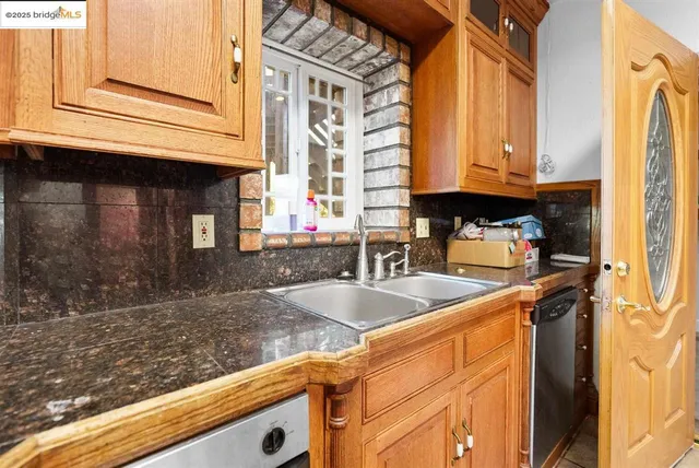 a view of a city with mountains in the background