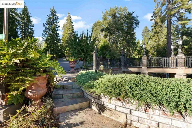 a view of a brick house with many windows