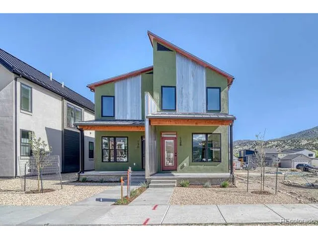 a view of a house with entrance gate
