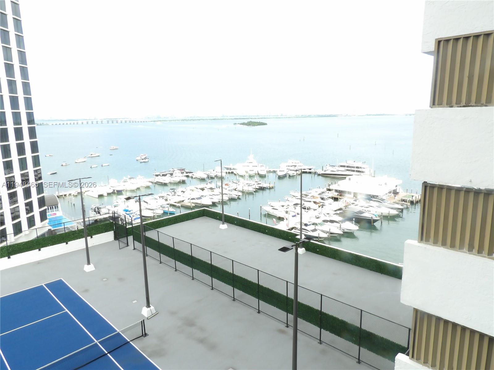 555 Northeast 15th Street, Unit 14E Miami, FL 33132 - Photo 2 of 26 a view of a terrace with city view