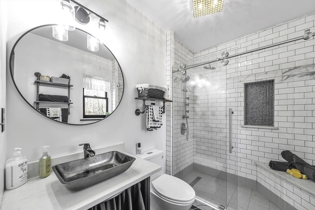 32 Stebbins Road Monson, MA 01057 - Photo 16 of 33 a bathroom with a sink toilet and shower