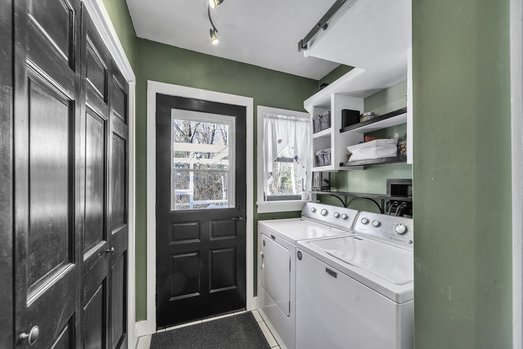 32 Stebbins Road Monson, MA 01057 - Photo 21 of 33 a room with cabinets and washer