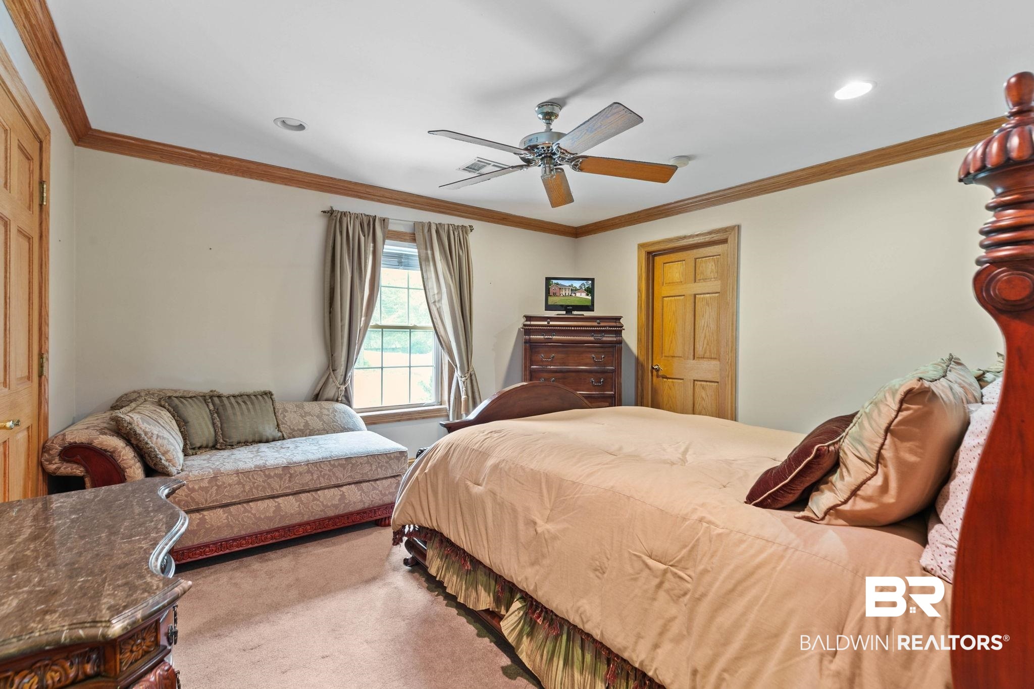 2 Speckle Trout Route Daphne, AL 36527 - Photo 29 of 61 Bedroom featuring ornamental molding, carpet, and a ceiling fan