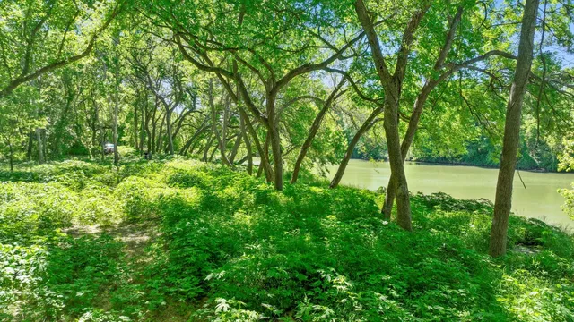 a view of a lake with a big yard