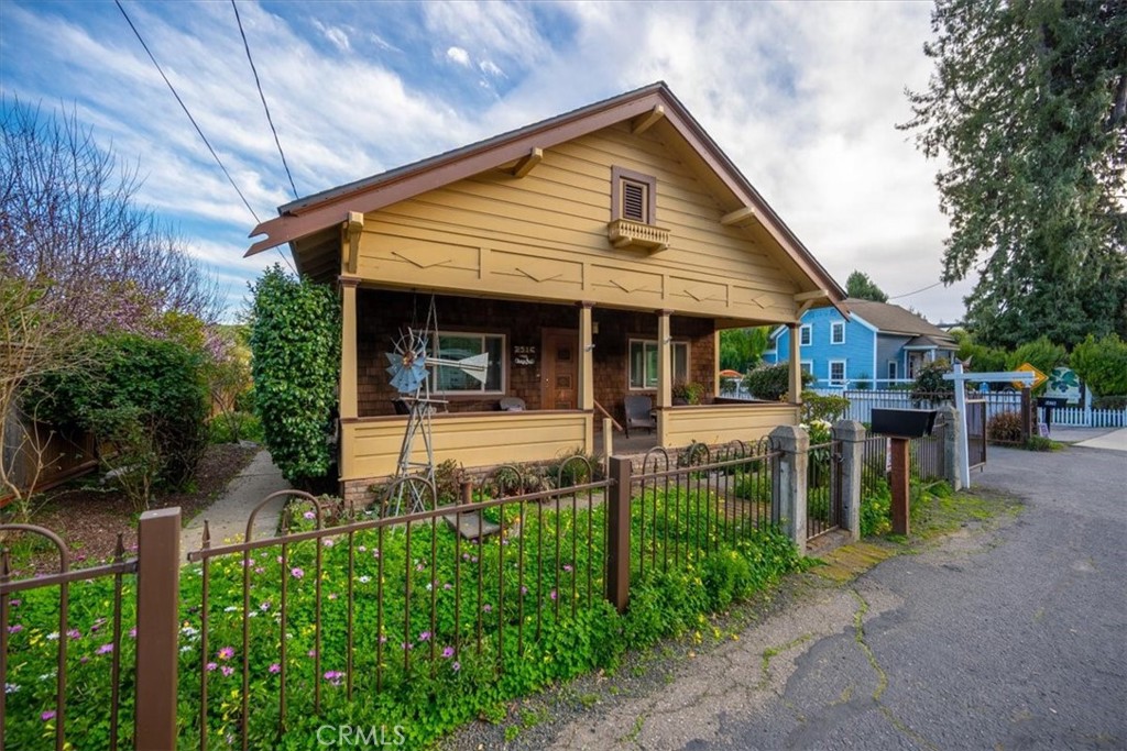 a front view of a house with a porch