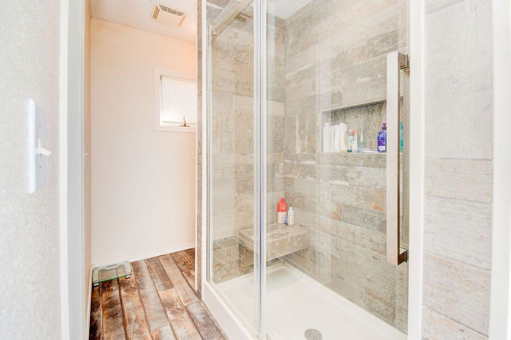 3298 Hawk Road Levelland, TX 79336 - Photo 16 of 32 a bathroom with a shower