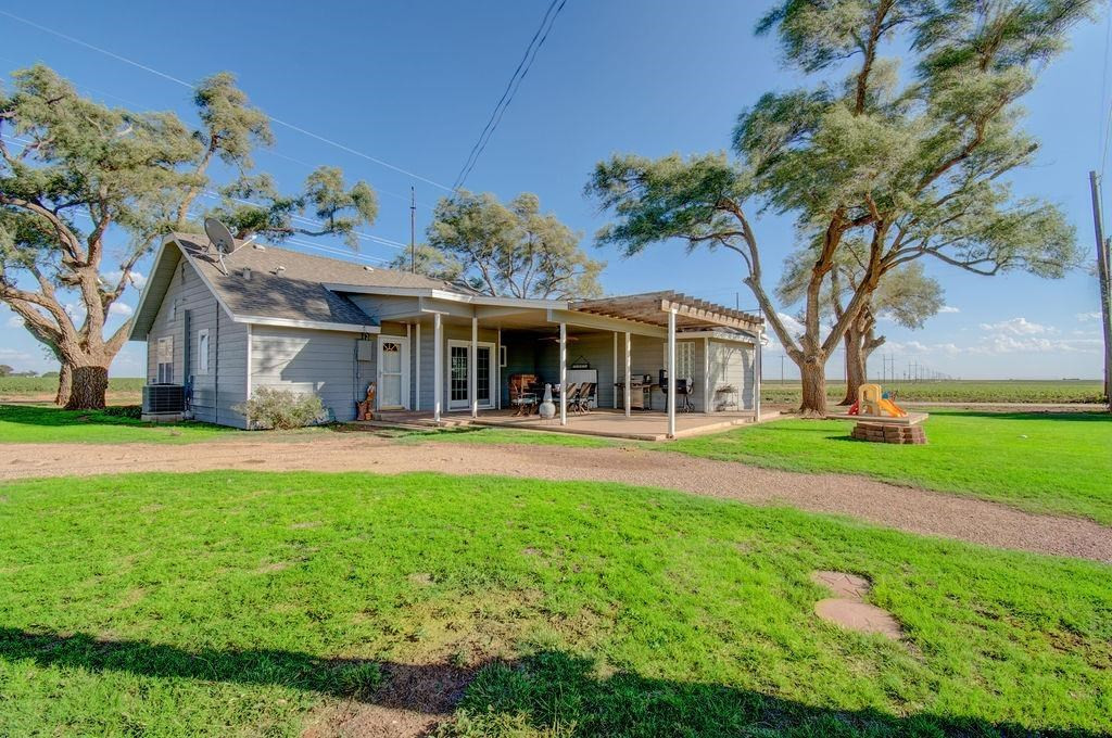 3298 Hawk Road Levelland, TX 79336 - Photo 28 of 32 a view of a house with a yard