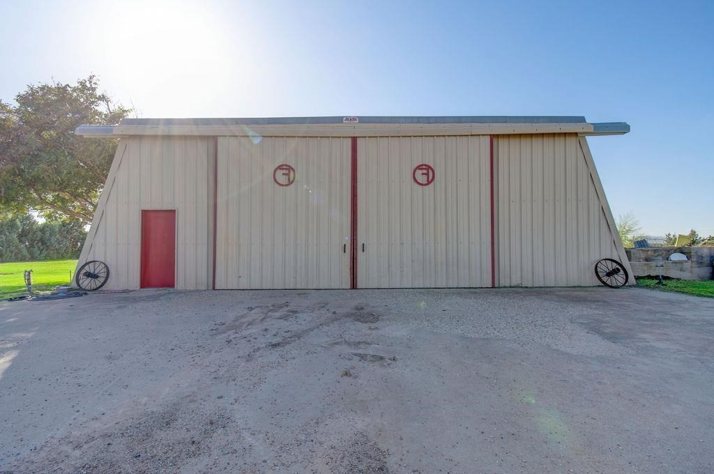 3298 Hawk Road Levelland, TX 79336 - Photo 29 of 32 a view of a house with backyard space