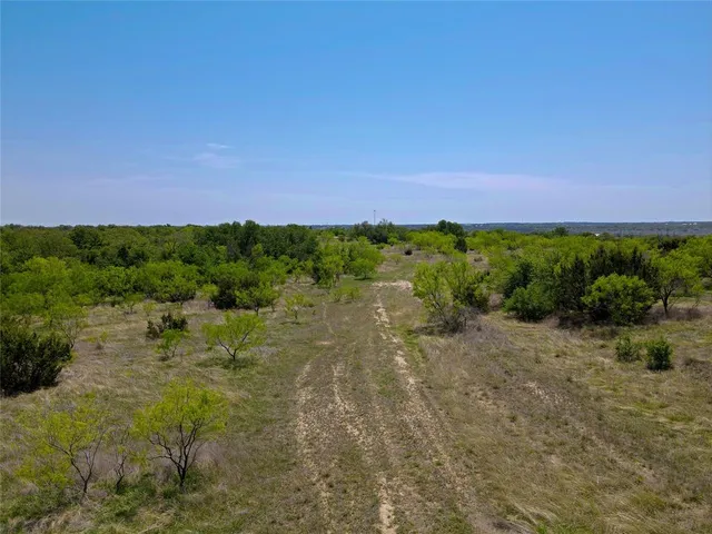 a view of a lake with a city