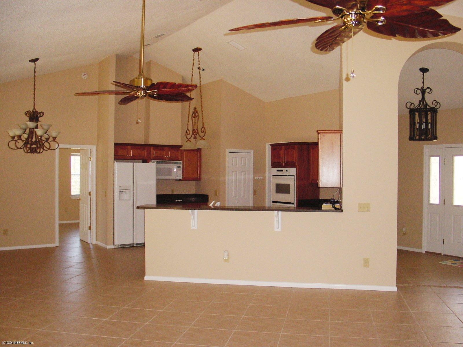 4051 Lazy Acres Road Middleburg, FL 32068 - Photo 3 of 8 Dining area, kitchen, foyer, great room