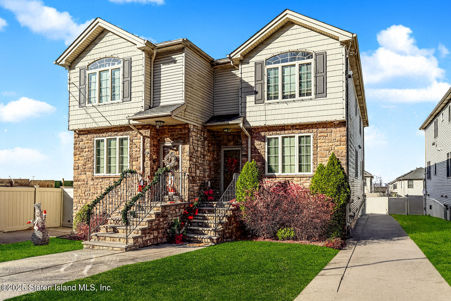1352 Forest Hill Road Staten Island, NY 10314 - Photo 1 of 19 a front view of house with a garden