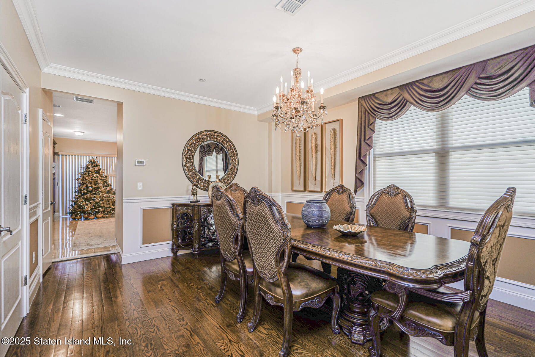 1352 Forest Hill Road Staten Island, NY 10314 - Photo 6 of 19 a view of a dining room with furniture and wooden floor