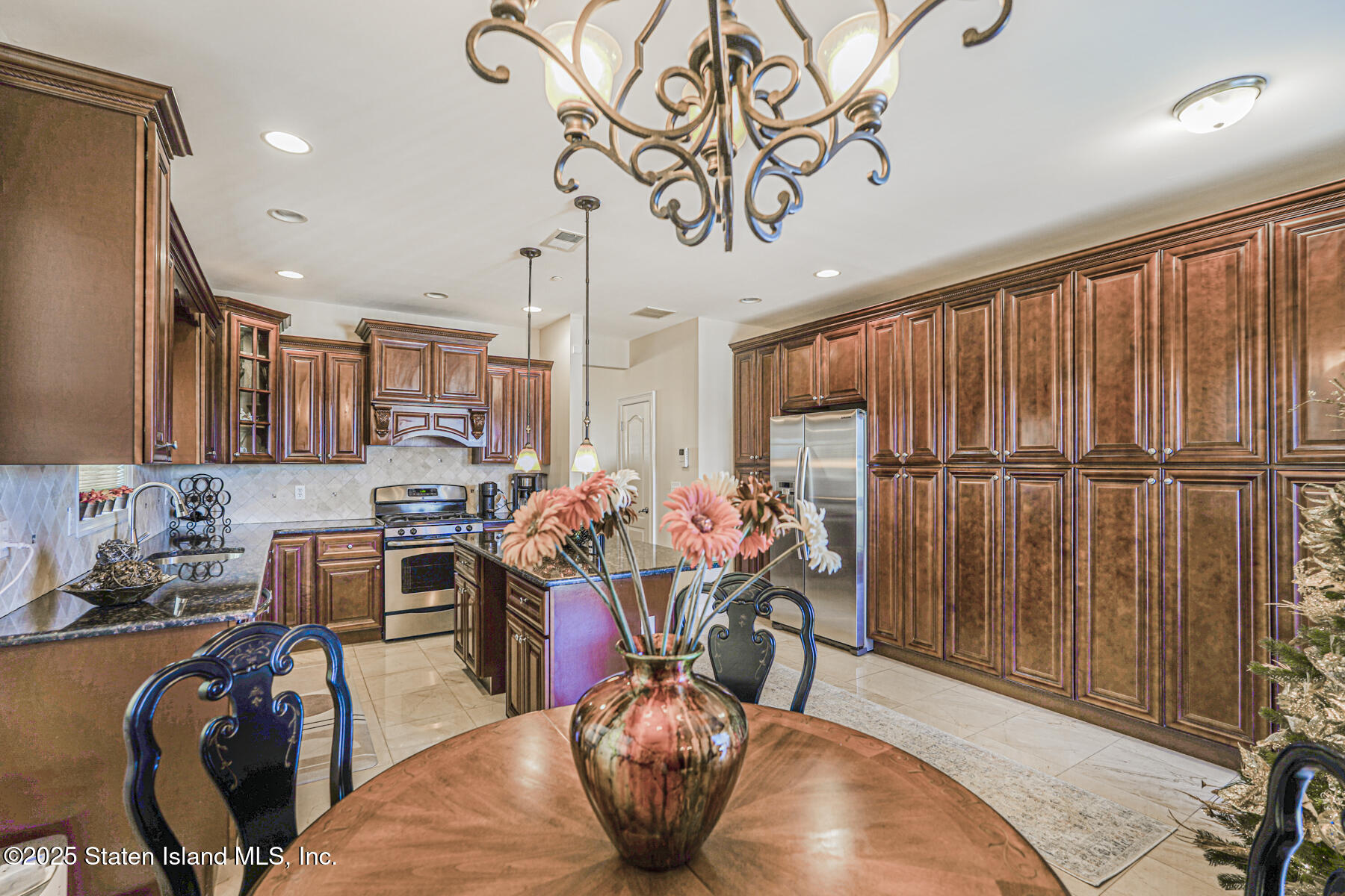 1352 Forest Hill Road Staten Island, NY 10314 - Photo 8 of 19 a view of a dining room with furniture window and outside view