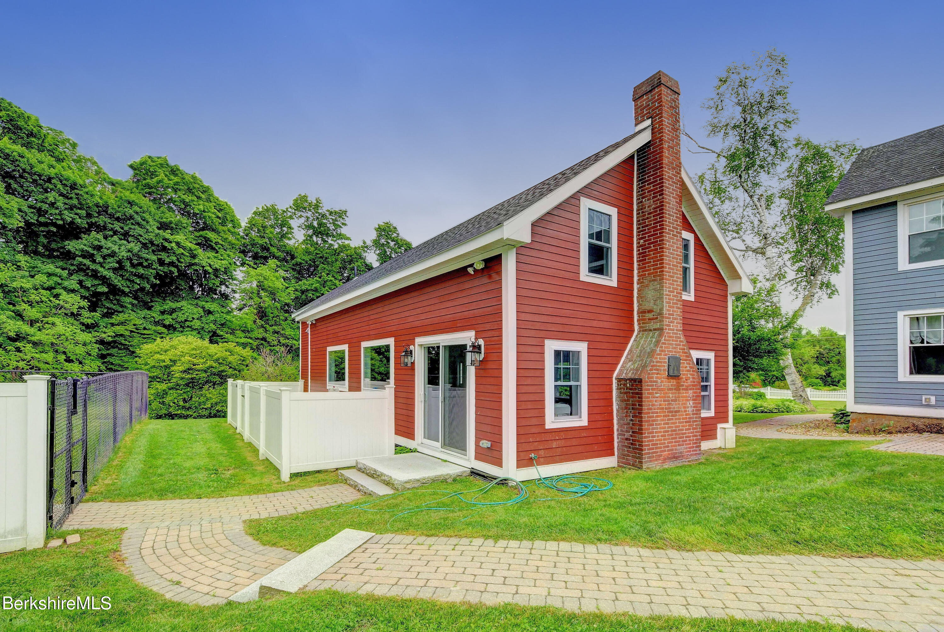 1 Devon Road Stockbridge, MA 01262 - Photo 57 of 58 a view of a house with a yard and plants