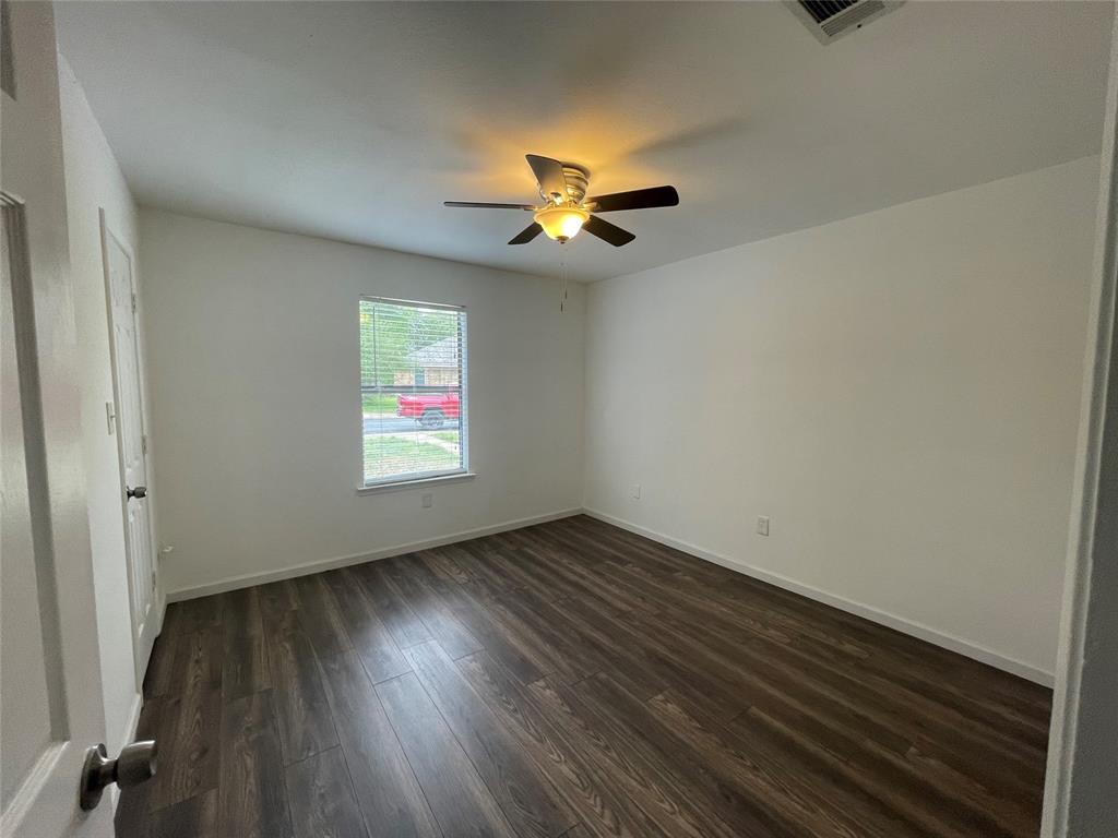 3 Ridge Drive Hickory Creek, TX 75065 - Photo 19 of 20 wooden floor in an empty room with a window
