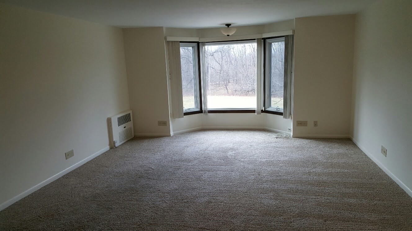 200 Thames Parkway, Unit 2J Park Ridge, IL 60068 - Photo 2 of 21 a view of room with window