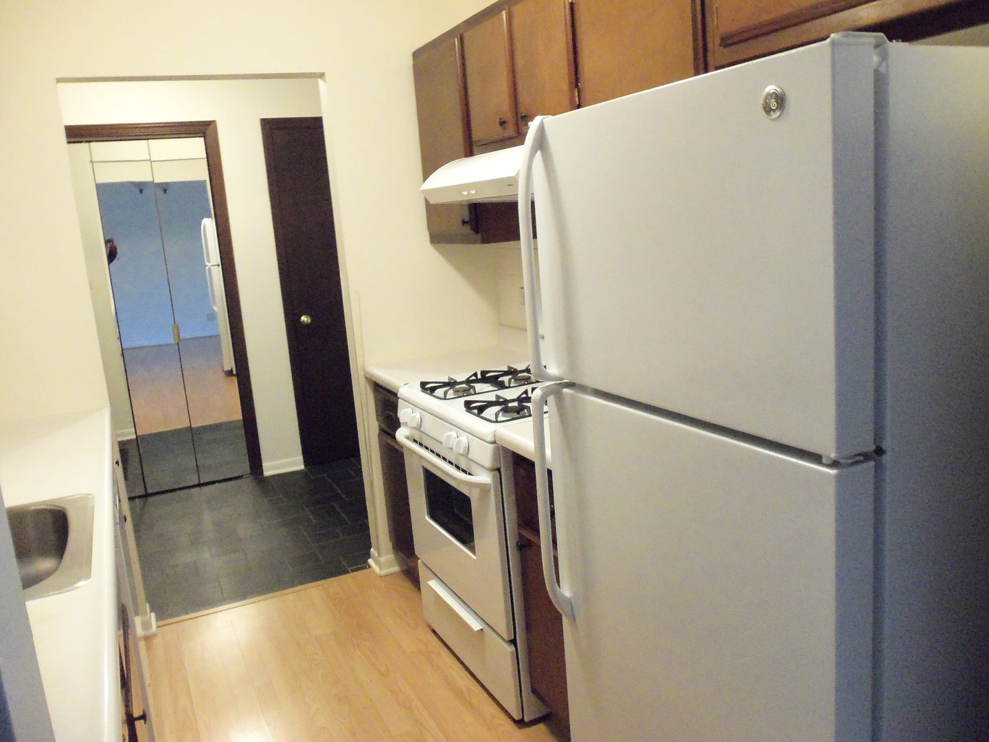 200 Thames Parkway, Unit 2J Park Ridge, IL 60068 - Photo 7 of 21 a view of kitchen with stainless steel appliances a refrigerator and a stove