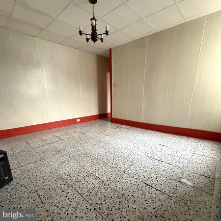 a view of a room with an empty space
