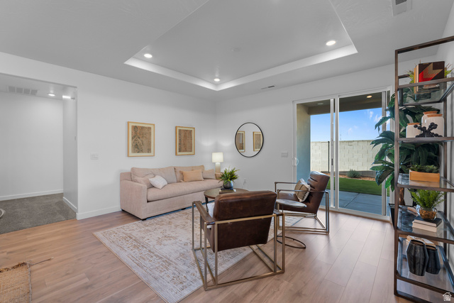 1589 South Fins Road, Unit 4178 Washington, UT 84780 - Photo 17 of 30 Living area featuring wood-finish flooring and a tray ceiling with recessed lighting
