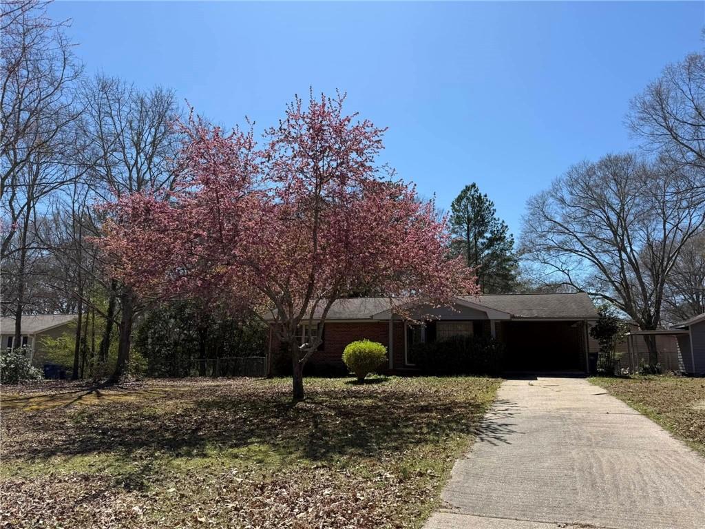 858 Idlewood Road Winder, GA 30680 - Photo 1 of 1 a front view of a house with a yard