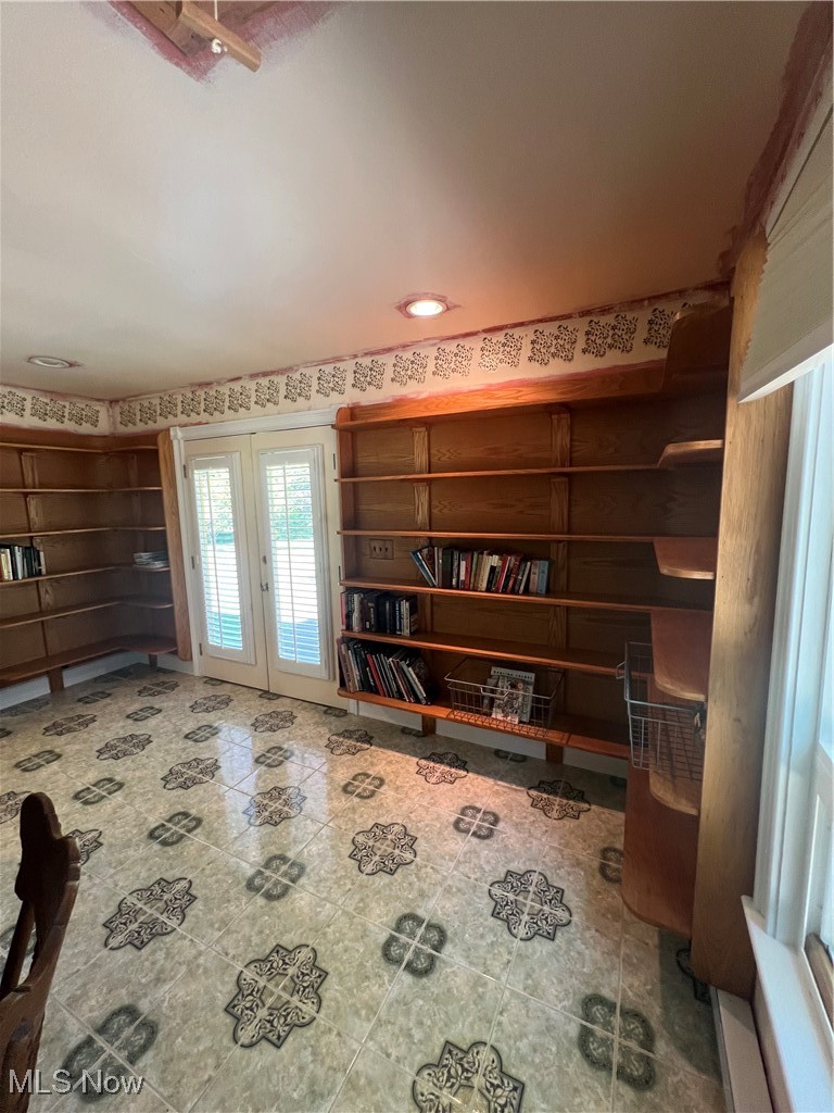 6171 Barrett Road Geneva, OH 44041 - Photo 38 of 38 Unfurnished room featuring tile patterned flooring and french doors