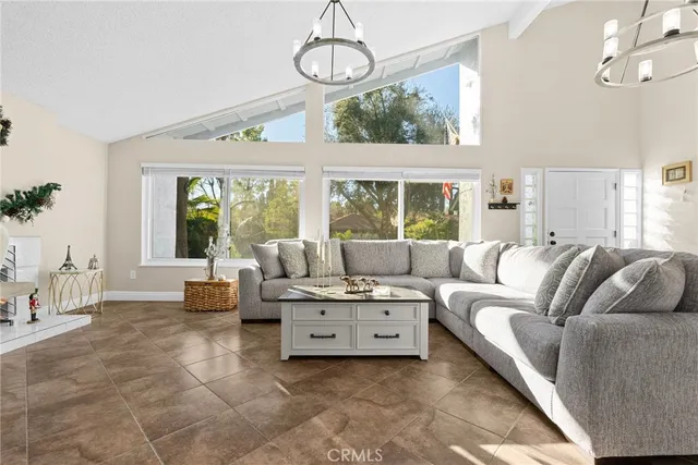 a view of a dining room with furniture and window