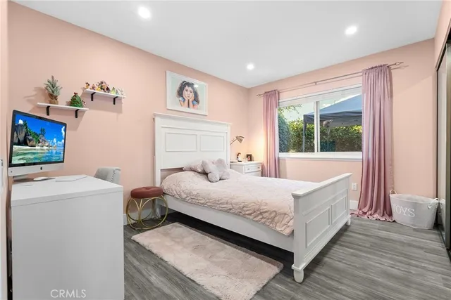 a bathroom with a double vanity sink toilet and shower
