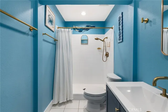 an aerial view of a house with a garden