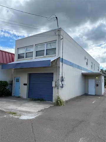 a view of a house with a garage