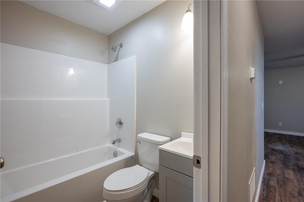 78 Ridgeback Road Talking Rock, GA 30175 - Photo 25 of 41 a bathroom with a toilet a sink and bathtub