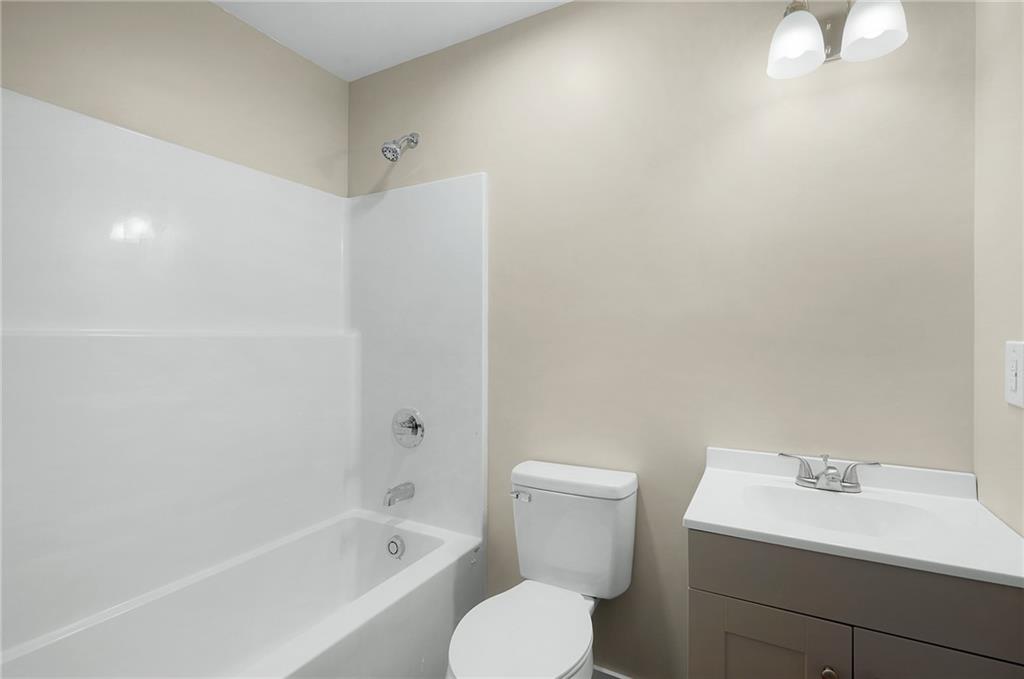 78 Ridgeback Road Talking Rock, GA 30175 - Photo 27 of 35 a bathroom with a toilet a sink and a bathtub