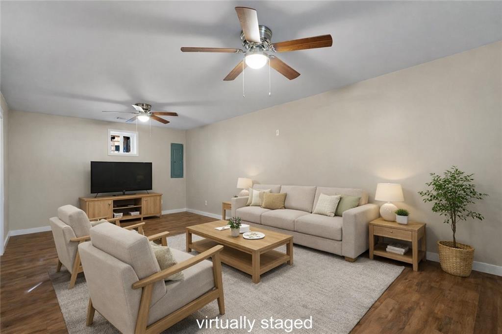 78 Ridgeback Road Talking Rock, GA 30175 - Photo 31 of 41 a living room with furniture and a flat screen tv