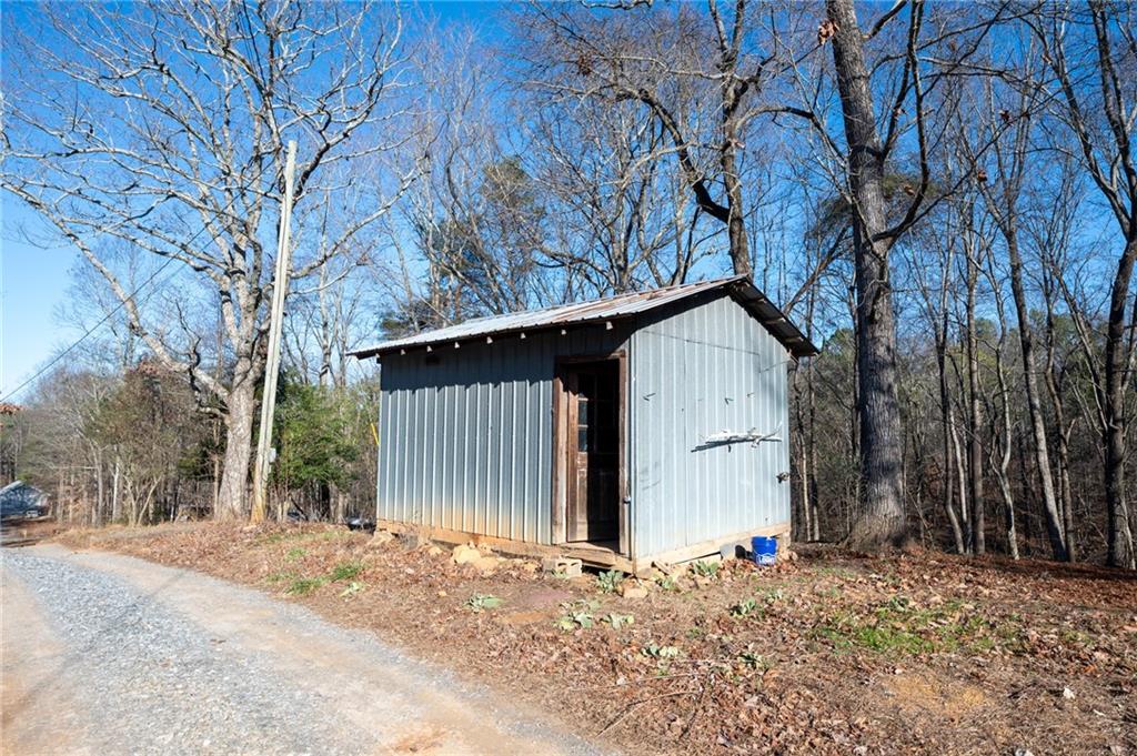 78 Ridgeback Road Talking Rock, GA 30175 - Photo 31 of 35 a house with a tree in front of it