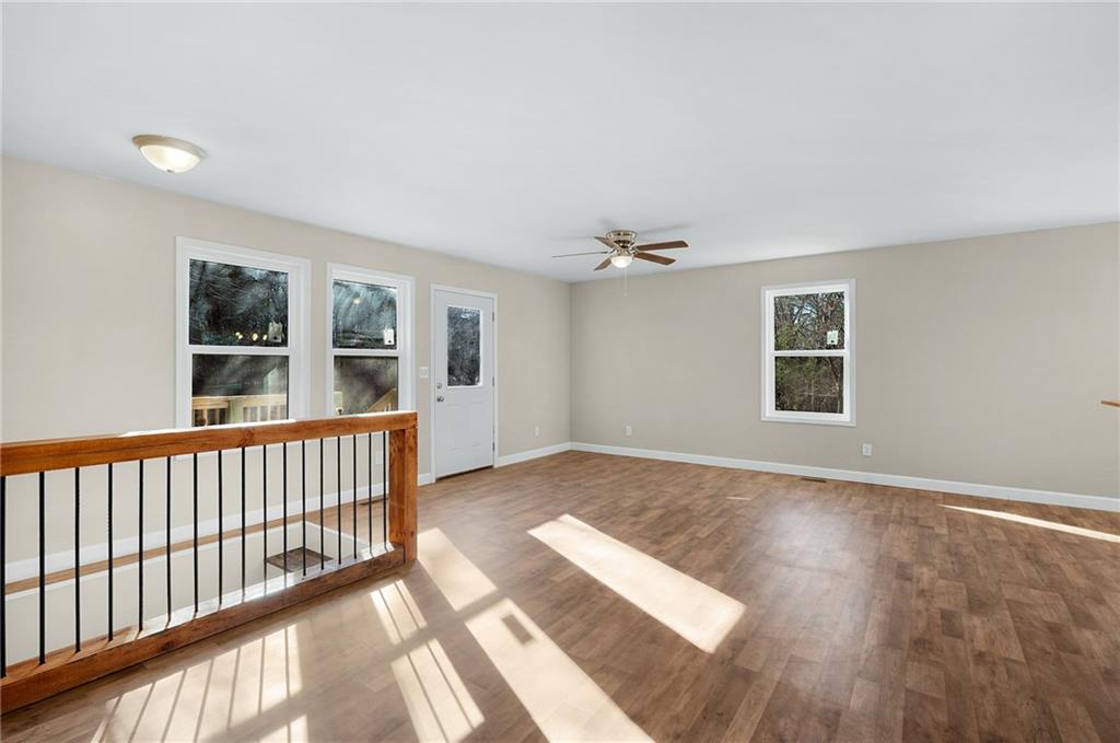 78 Ridgeback Road Talking Rock, GA 30175 - Photo 8 of 35 a view of wooden floor and windows in a room