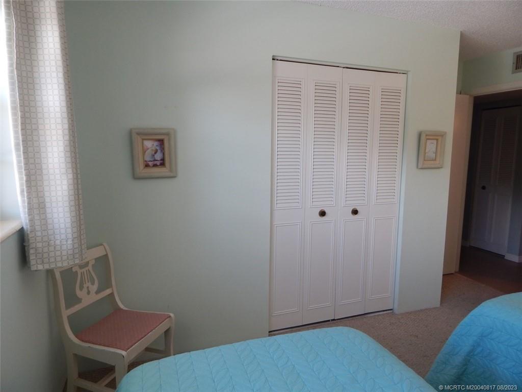 2950 Southeast Ocean Boulevard, Unit 55 Stuart, FL 34996 - Photo 21 of 24 a view of a room with workspace and a window