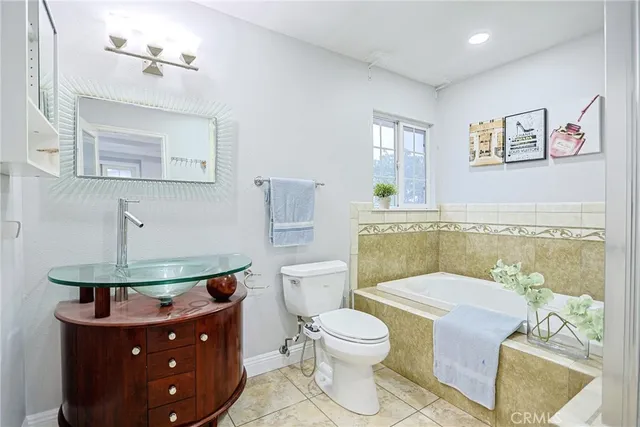 a view of an empty room and wooden floor