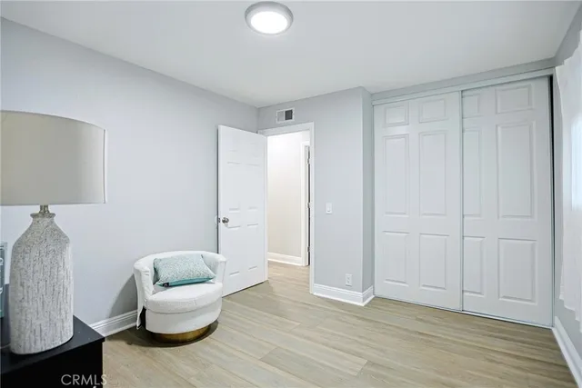 a room with a bed and a window