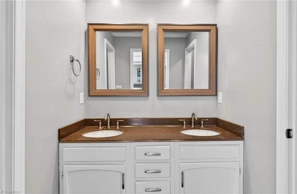 7736 Penns Grove Road Summerfield, NC 27358 - Photo 21 of 50 Two sinks and two closets in the primary suite!