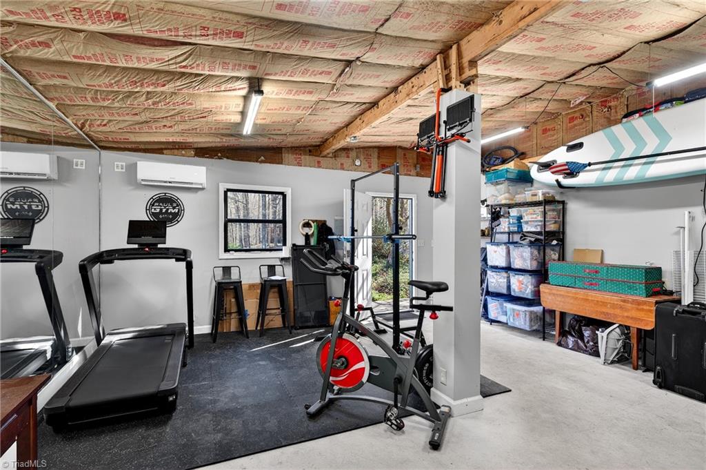 7736 Penns Grove Road Summerfield, NC 27358 - Photo 41 of 50 Temperature controlled storage/workout area