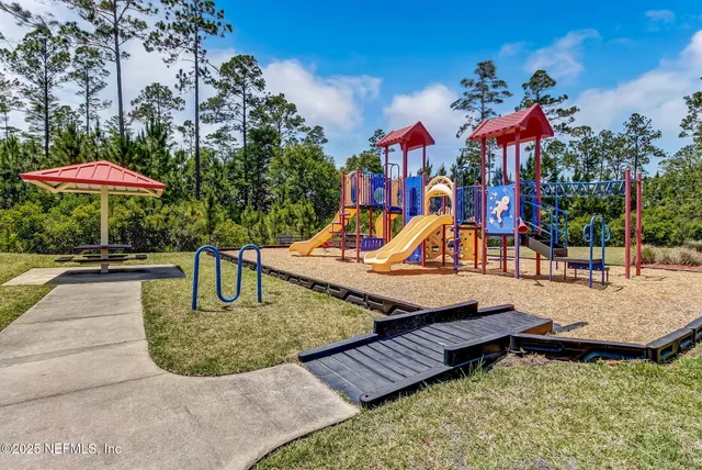 a view of a swimming pool with a yard
