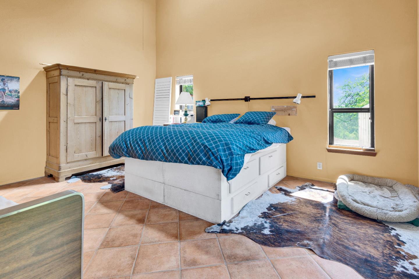 38483 Milpitas Road Greenfield, CA 93927 - Photo 23 of 55 a bedroom with a bed lamp and a window