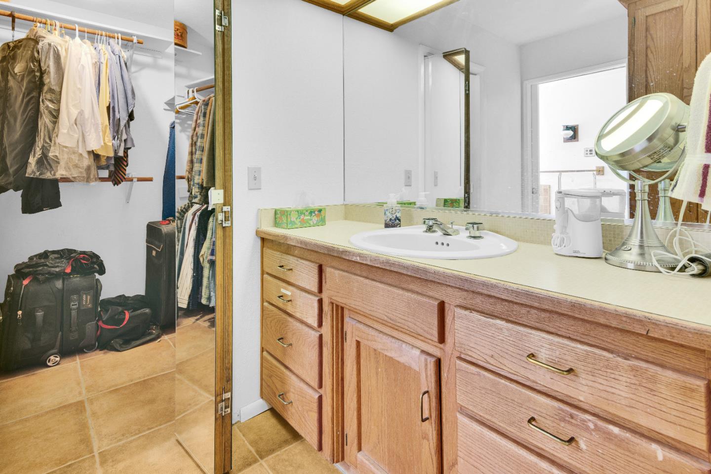 38483 Milpitas Road Greenfield, CA 93927 - Photo 24 of 55 a bathroom with a sink double vanity and a mirror