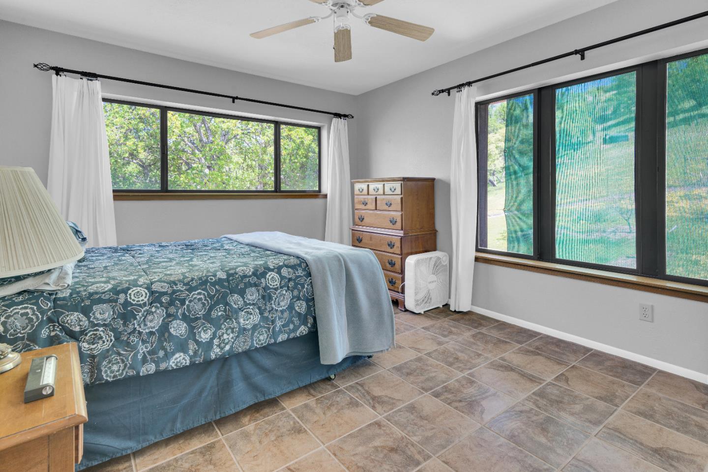 38483 Milpitas Road Greenfield, CA 93927 - Photo 30 of 55 a bedroom with a bed and a large window