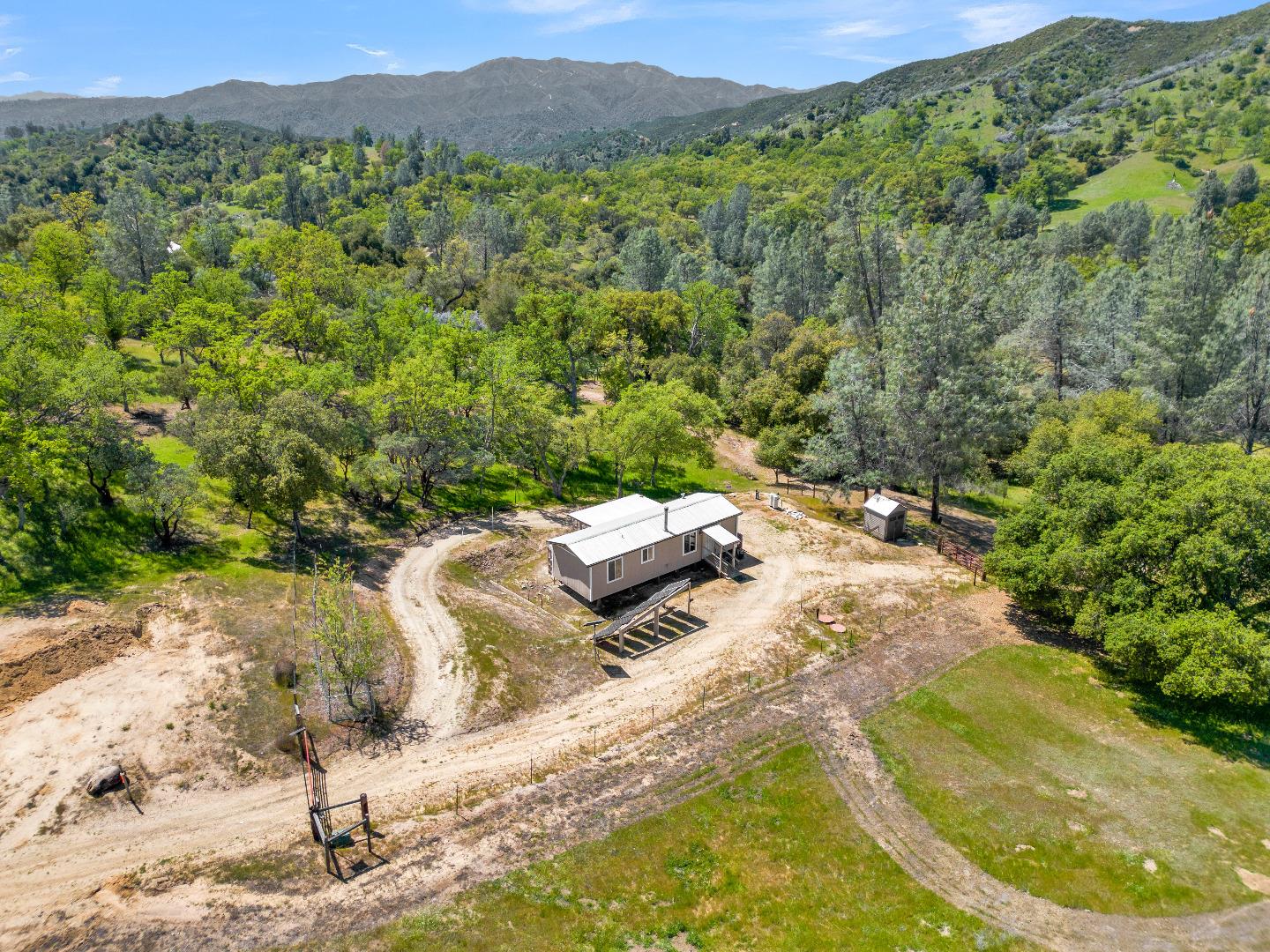 38483 Milpitas Road Greenfield, CA 93927 - Photo 8 of 55 a view of a small house with a yard