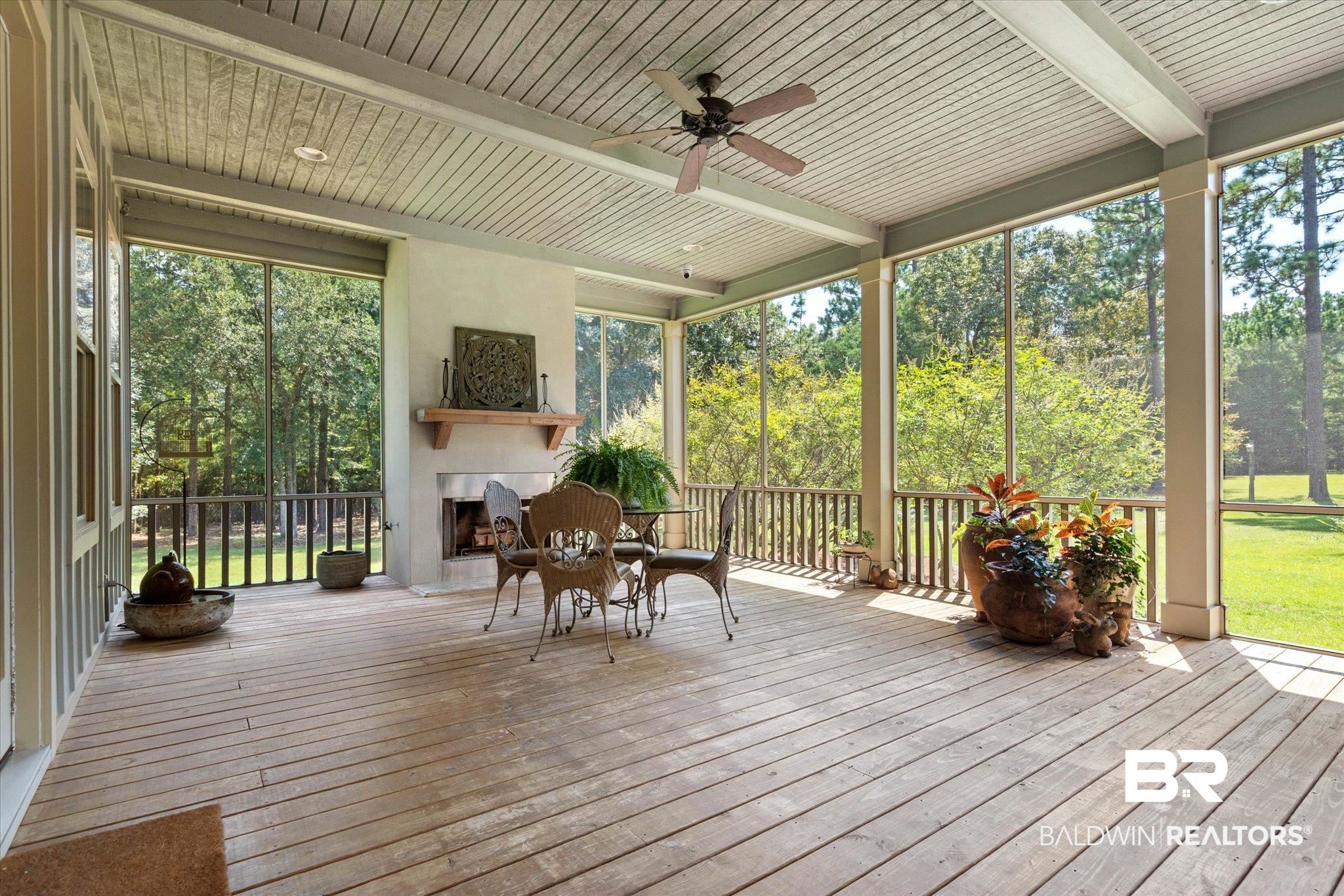 36001 Sibley Road Stapleton, AL 36578 - Photo 8 of 64 View of screened rear porch with fireplace.