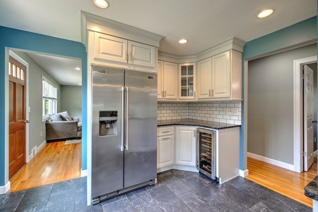 20 Martin Farms Road Hampden, MA 01036 - Photo 13 of 35 a kitchen with cabinets and stainless steel appliances
