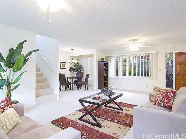 1835 Pacific Heights Road Honolulu, HI 96813 - Photo 1 of 1 a living room with furniture and a potted plant