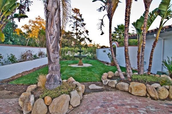 3340 Foothill Road Santa Barbara, CA 93105 - Photo 5 of 14 a view of a table and chairs in a backyard