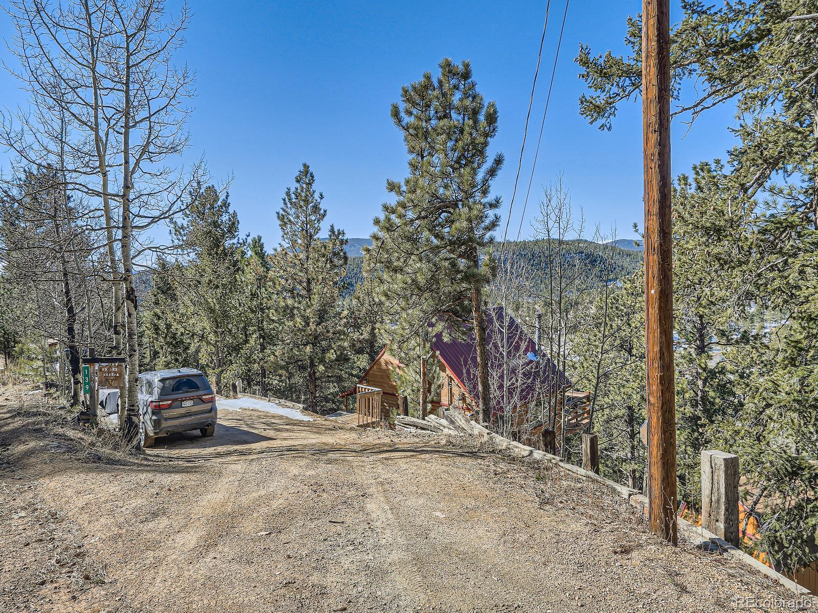 139 Hayes Street Bailey, CO 80421 - Photo 5 of 28 a car parked on the side of the road